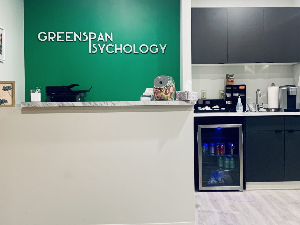 Welcoming reception desk at Greenspan Psychology counselling clinic in Edmonton